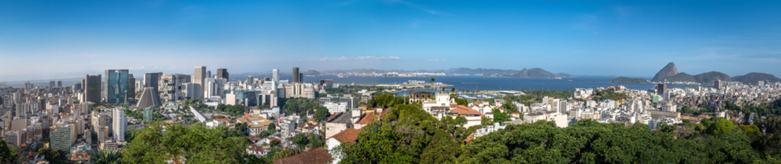 Fototapeta na wymiar Panoramic aerial view of downtown Rio de Janeiro with Sugar Loaf mountain on background - Rio de Janeiro, Brazil