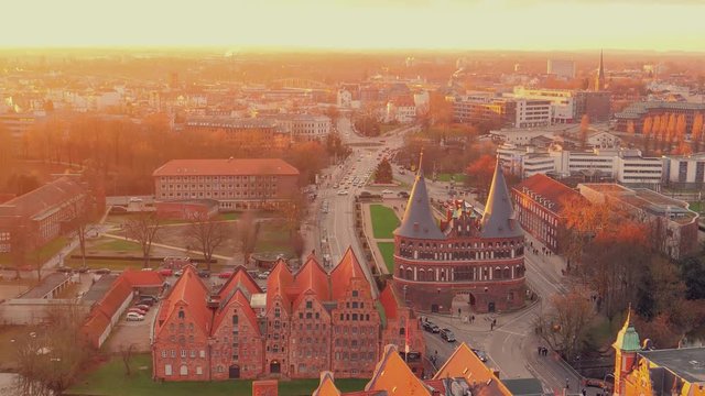 Historical Holstentor City Gate panoramic view at sunset. Lubeck