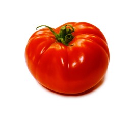 Ripe red tomato isolated on a white background.