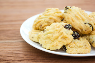 Closeup butter cookies on white plate. Sweet dessert.