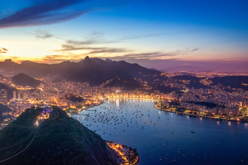 Aerial view of Rio de Janeiro at night with Urca and Corcovado mountain and Guanabara Bay - Rio de Janeiro, Brazil - obrazy, fototapety, plakaty