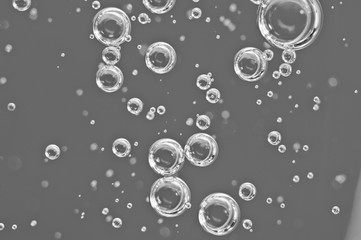 Water Black-and-white structure. Bubbles of oxygen under water. Macro