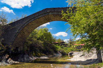 View of the restored traditional stone bridge of Chrysavgi in Thessaly, Greece