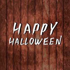 Happy Halloween hand written with brush. Grunge style lettering. White gouache drawing on wooden background. Halloween party banner or greeting card.