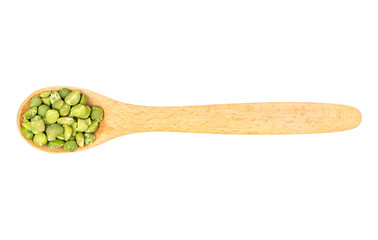 Dry green peas in spoon