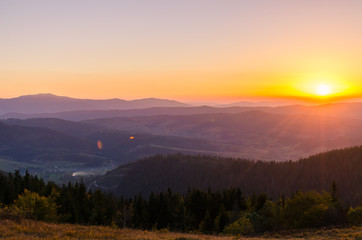 Fototapeta premium Sunset in the Carpathian Mountains in the autumn season