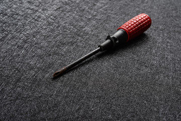 phillips screw driver on a dark background