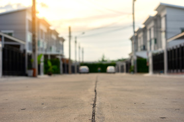 close up ground cement the road in town home in village with sunset light
