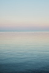 Fototapeta na wymiar Blue sky landscape without clouds spreading on the sea