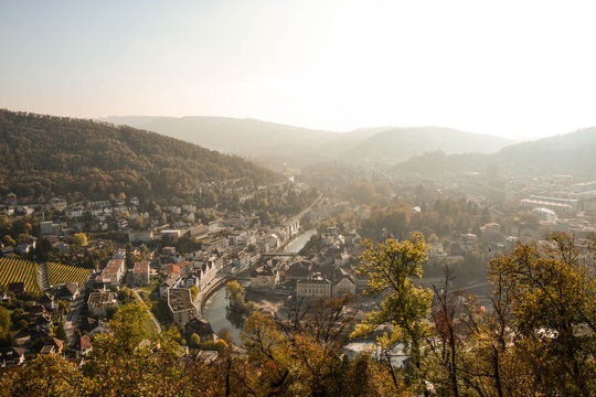 scenic panorama of a city in baden aargau switzerland in autumn with fog in background