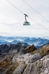 scenic landscape view from s&auml;ntis in the swiss alps alpstein mountains panorama with cable car in foreground