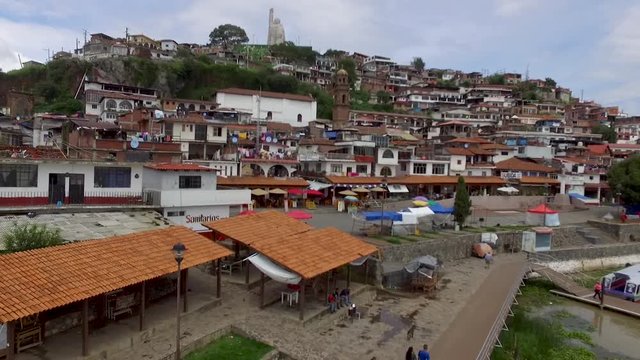 Aerial drone shot fly away from the Island of Janitzio, Mexico