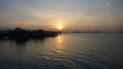 Beautiful silhouette during sunrise at Tan Jetty, George Town, Penang