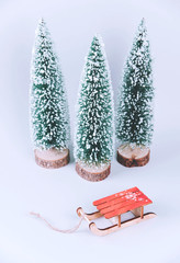 Stylish vintage wooden sled with xmas tree.