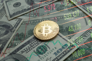 Fototapeta na wymiar Golden Bitcoins Coins lying on dollars.