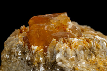 Macro Mineral Stone Sheelit on a black background