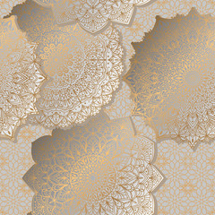 Seamless background with ornament mandala in gold color. Round arabesque design pattern.