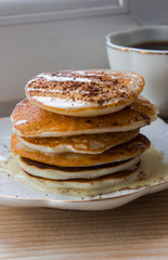 Protein pancakes with rice flour on a white plate. Useful baking.