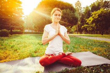 girl doing yoga outdoors