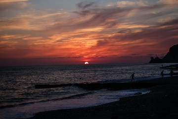 fabulous red, burgundy sky.  Sunset on the sea.