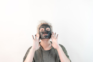 show pure emotions - face of a woman with a black mask 