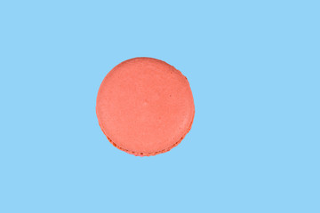 French macaroon isolated on the blue background