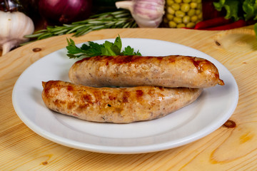 Roasted sausages in the plate
