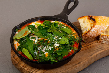 Traditional shakshouka with herbs