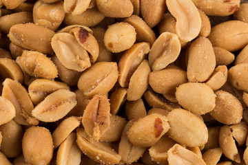 large amount of peeled salted peanuts