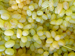organic juicy green grapes top view closeup, natural background