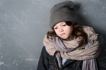 Unhappy girl with dirty face