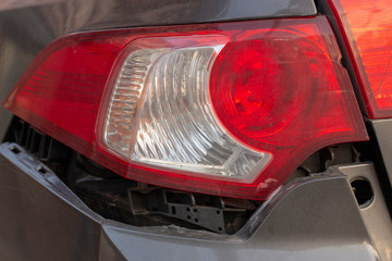 car has dented rear bumper damaged after accident