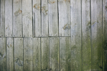 Old vintage wooden planks of the house. Grey wood texture background.