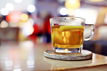 English tea in a cafe / cup and kettle with five o'clock tea