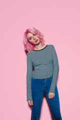 Modern hipster woman with pink hair