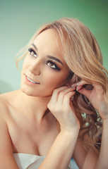 the bride is preparing for the wedding