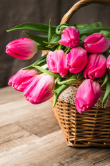 Beautiful bouquet from pink tulips  on a table