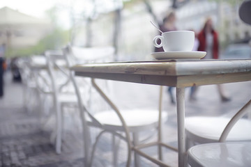 cup of coffee for breakfast in a cafe / serving cup of coffee in modern interior, a European breakfast