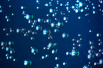 air bubbles in water macro background / blue background abstract bubbles in water