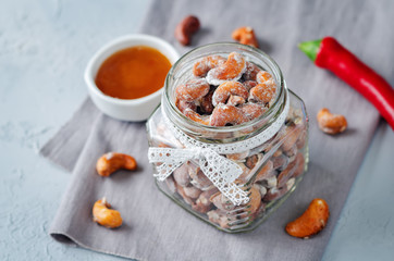Honey red pepper roasted cashews in a glass