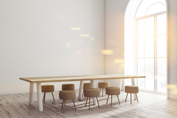 White dining room corner, long table