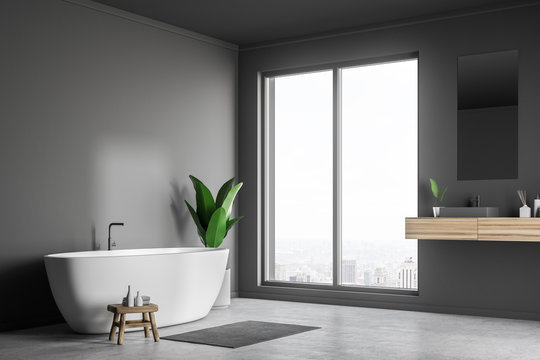 Gray bathroom corner, sink and tub