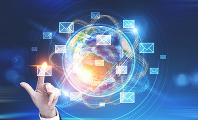 Woman hand touching earth email interface