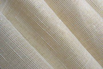 shiny fabric close-up gold canvas for decoration design textiles natural material cotton brocade...