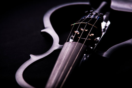 electronic violin on a black background