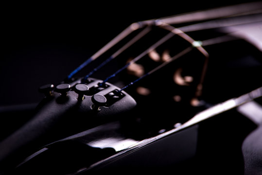 electronic violin on a black background