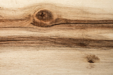 surface of a wooden board with dark knots and lines, birch texture, close up abstract background