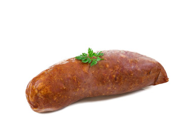 Morteau sausages wirg parsley in front of white background