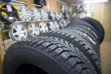 Obraz na płótnie Canvas Tire service. Tires and wheels.