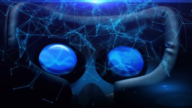 Virtual reality glasses, VR headset at night on a dark background. Digital simulation of blue particles